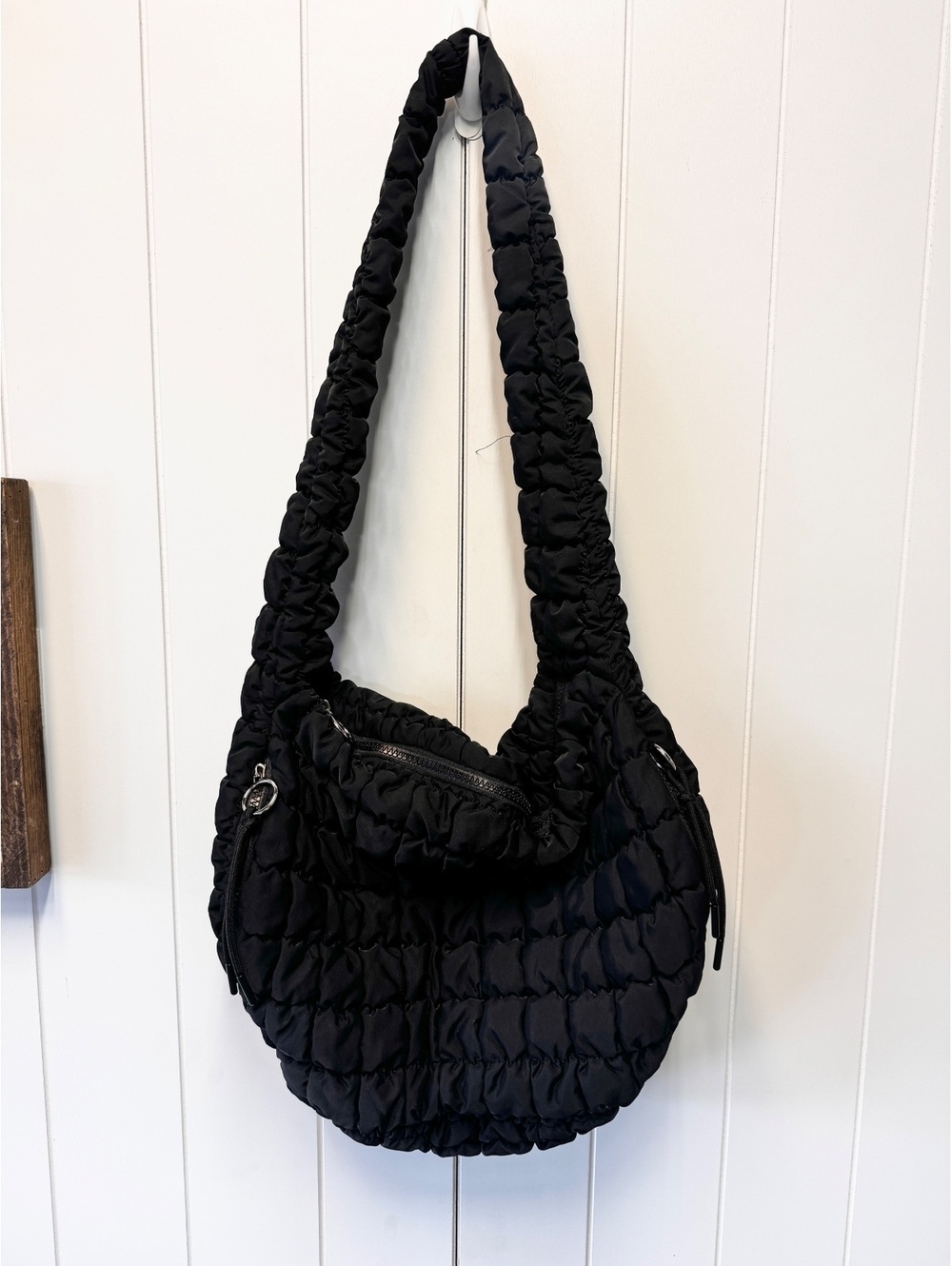 Black quilted ruched shoulder bag
